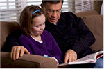 Father and daughter reading